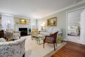 Sample living room and master bedroom of apartment at Edgewood Summit