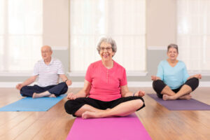 Residents taking a group exercise class together