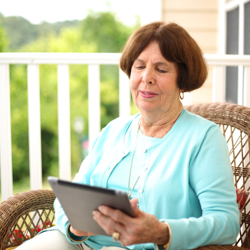 a woman searching her tablet
