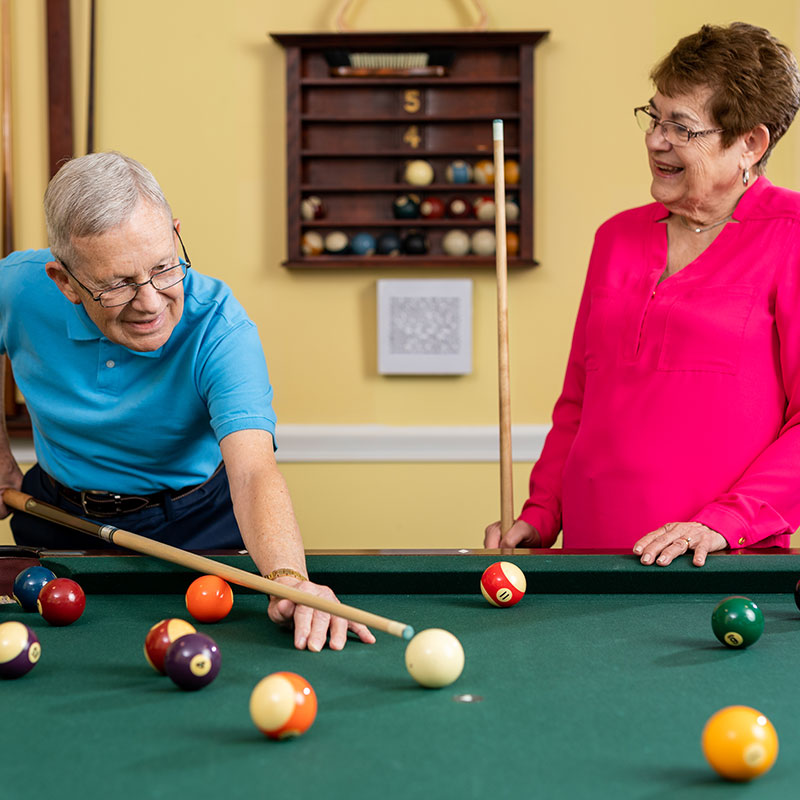 Seniors playing billiards